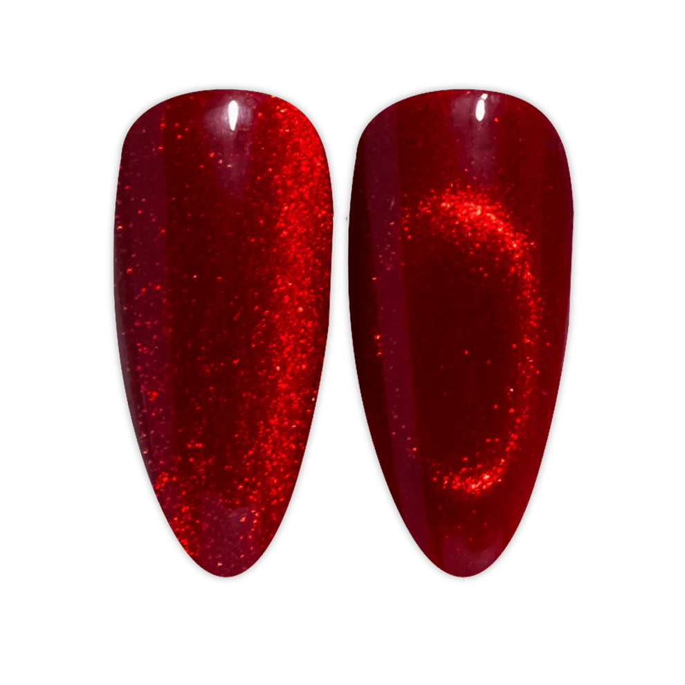 DND Diva 9D Cat Eye Gel Polish in Feisty Paws with glassball, showcasing vibrant, shimmering cat eye effect on a nail.
