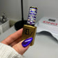 DND Diva 9D Cat Eye Gel Polish in Puma Purple with glassball effect, showcasing vibrant purple color and reflective finish.