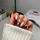 DND Diva 9D Cat Eye Gel Polish in Tiger Eyes shade with glassball effect, showcasing vibrant orange and gold hues.