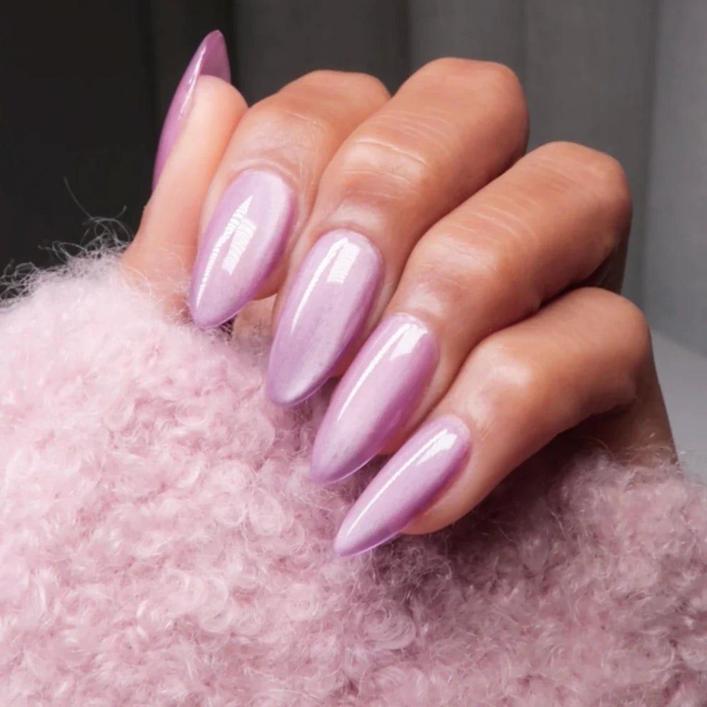 DND Diva 9D Cat Eye Gel Polish in Knead Affection, with glassball effect, showcasing deep purple color and shimmering finish.