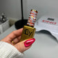 DND Diva 9D Cat Eye Gel Polish in shade Ro-meowtic with glassball finish, showcasing vibrant, shimmering cat eye effect.