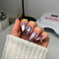 DND Diva 9D Cat Eye Gel Polish in Wild Berry with glassball effect, showcasing deep pink and purple hues and reflective finish.