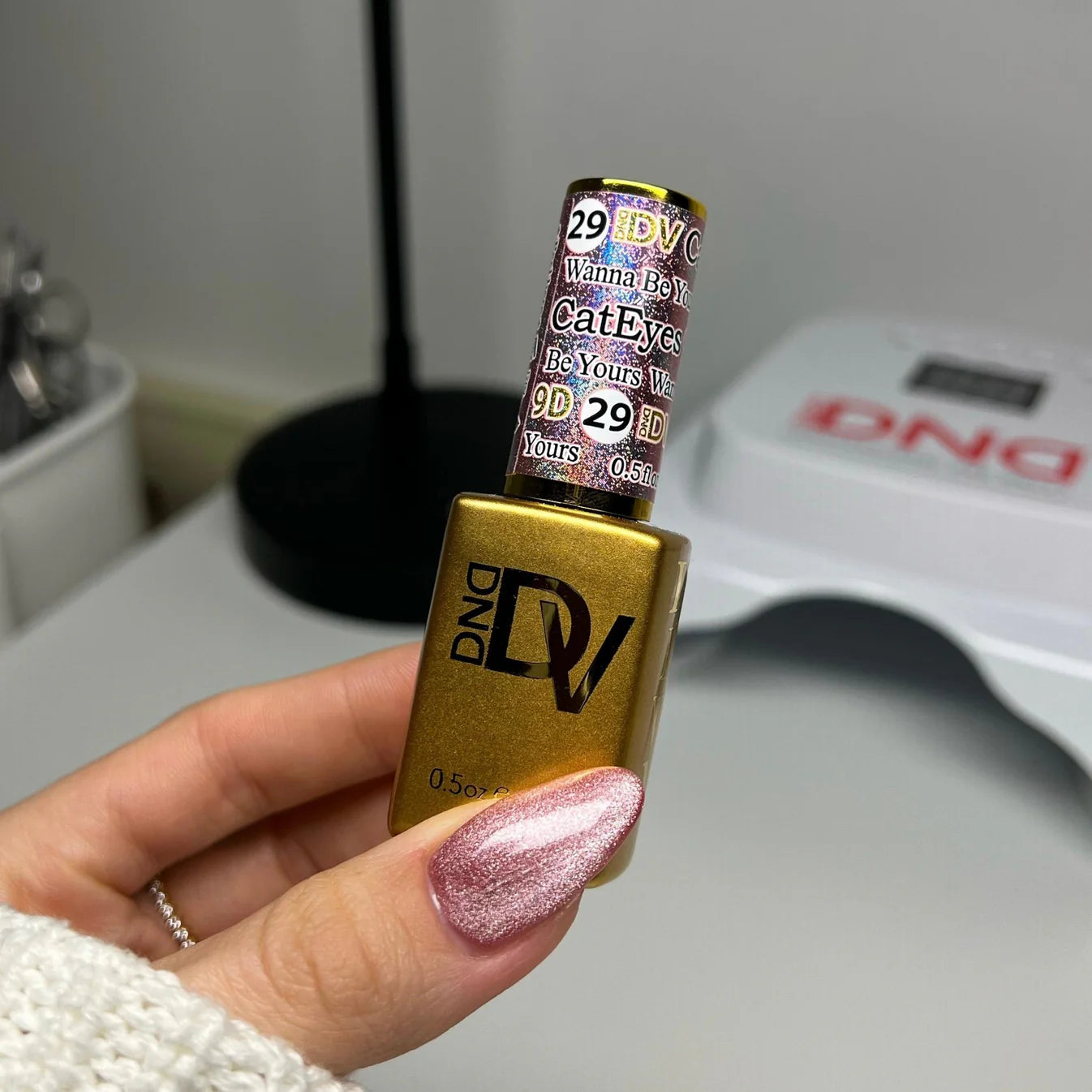 DND Diva 9D Cat Eye Gel Polish in shade Wanna Be Yours, featuring glassball effect and vibrant color for stylish nail designs.