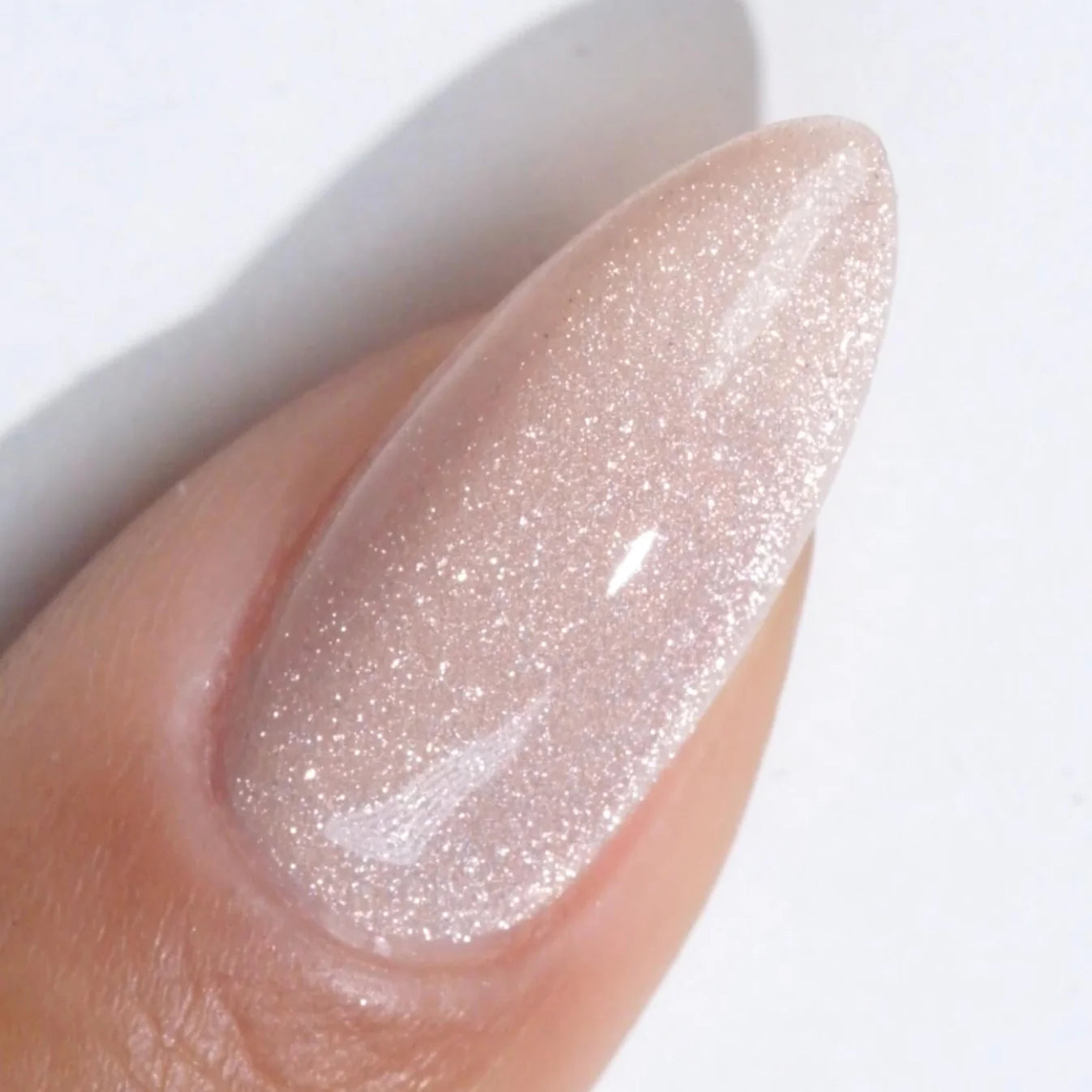 DND Diva 9D Cat Eye Gel Polish in Afterglow, showcasing a vibrant 9D glassball effect with a shimmering cat eye finish.