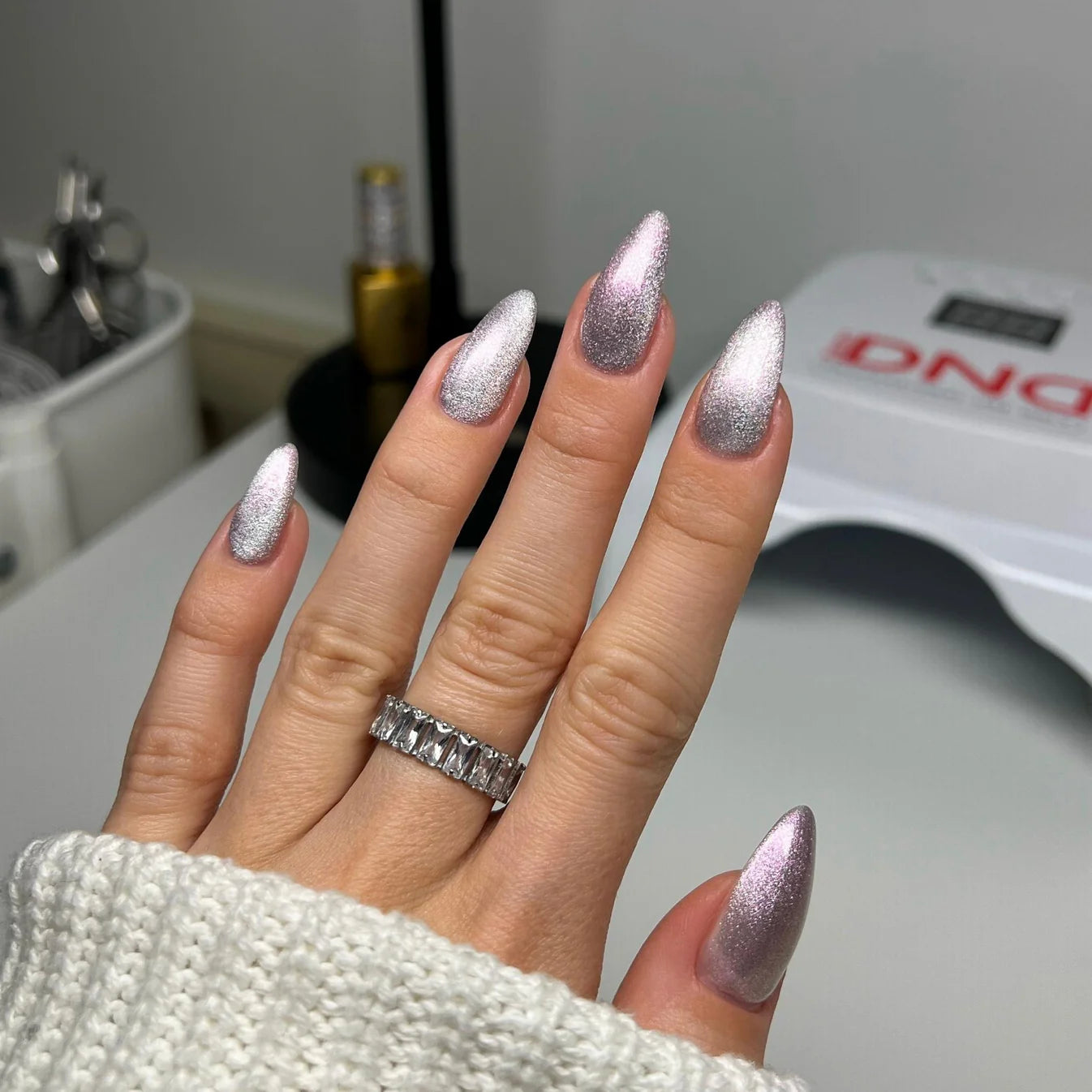 DND Diva Gel Polish 9D Cat Eye Glassball in shade #32 Catty Ever After, featuring a shimmering 9D cat eye effect with glassball finish.