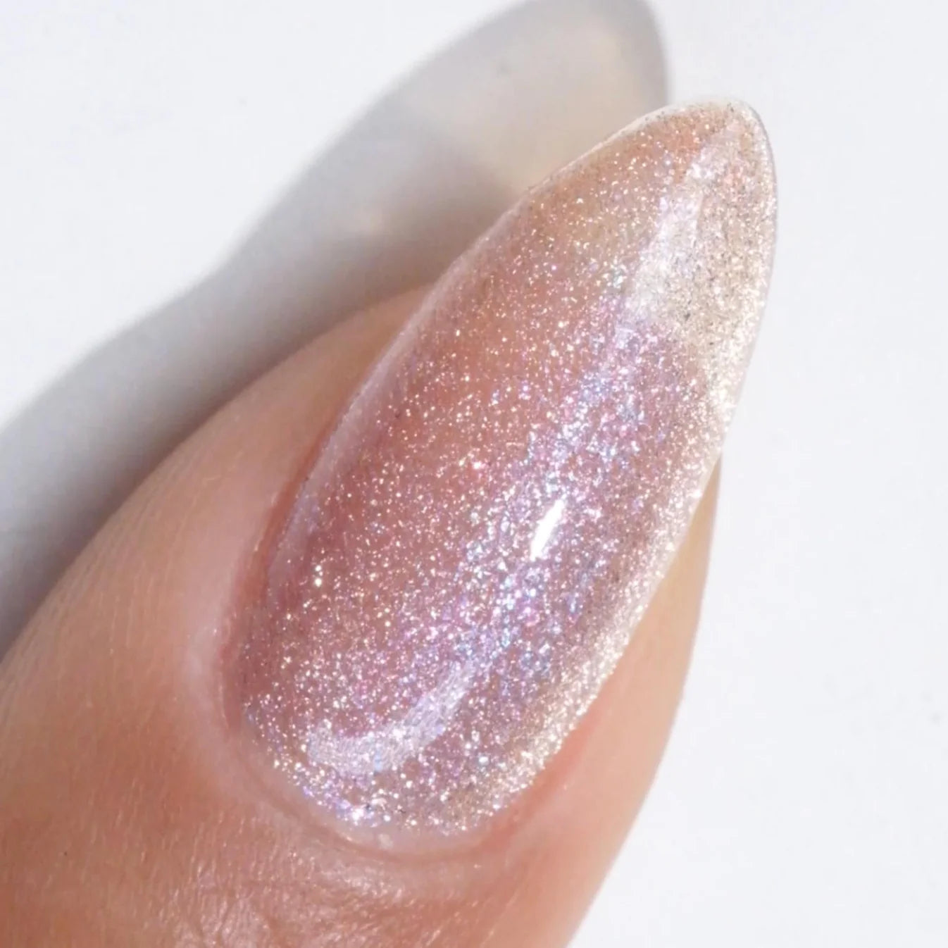 DND Diva 9D Cat Eye Gel Polish in Hazel Dreams, with shimmering glassball effect and deep hazel color.
