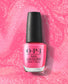OPI Dopa-mani nail polish bottle with creamy beige color, shiny finish, and OPI branding, shown against a plain background.