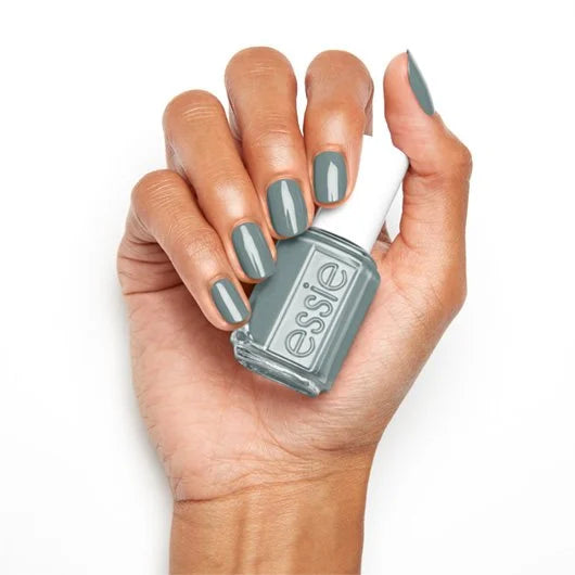Essie Nail Lacquer in Caught In The Rain #741, a vibrant rain-inspired nail polish bottle with colorful nail swatches.