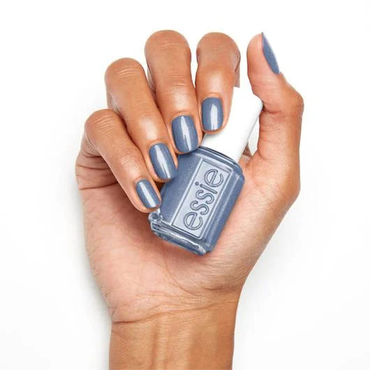 Essie A to Zzz nail lacquer bottle with purple cap and clear label, showcasing the colorful nail polish inside.