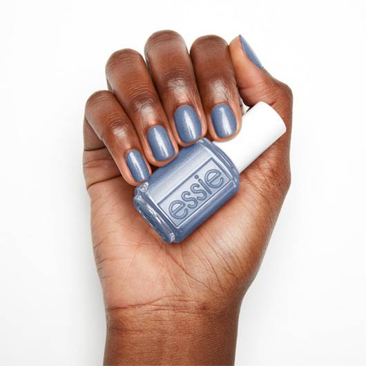 Essie A to Zzz nail lacquer bottle with the purple cap, showcasing the vibrant purple shade inside the glass bottle.