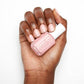 Essie Nail Lacquer in Hi Maintenance #100, a vibrant pink nail polish bottle with a white cap and colorful label.