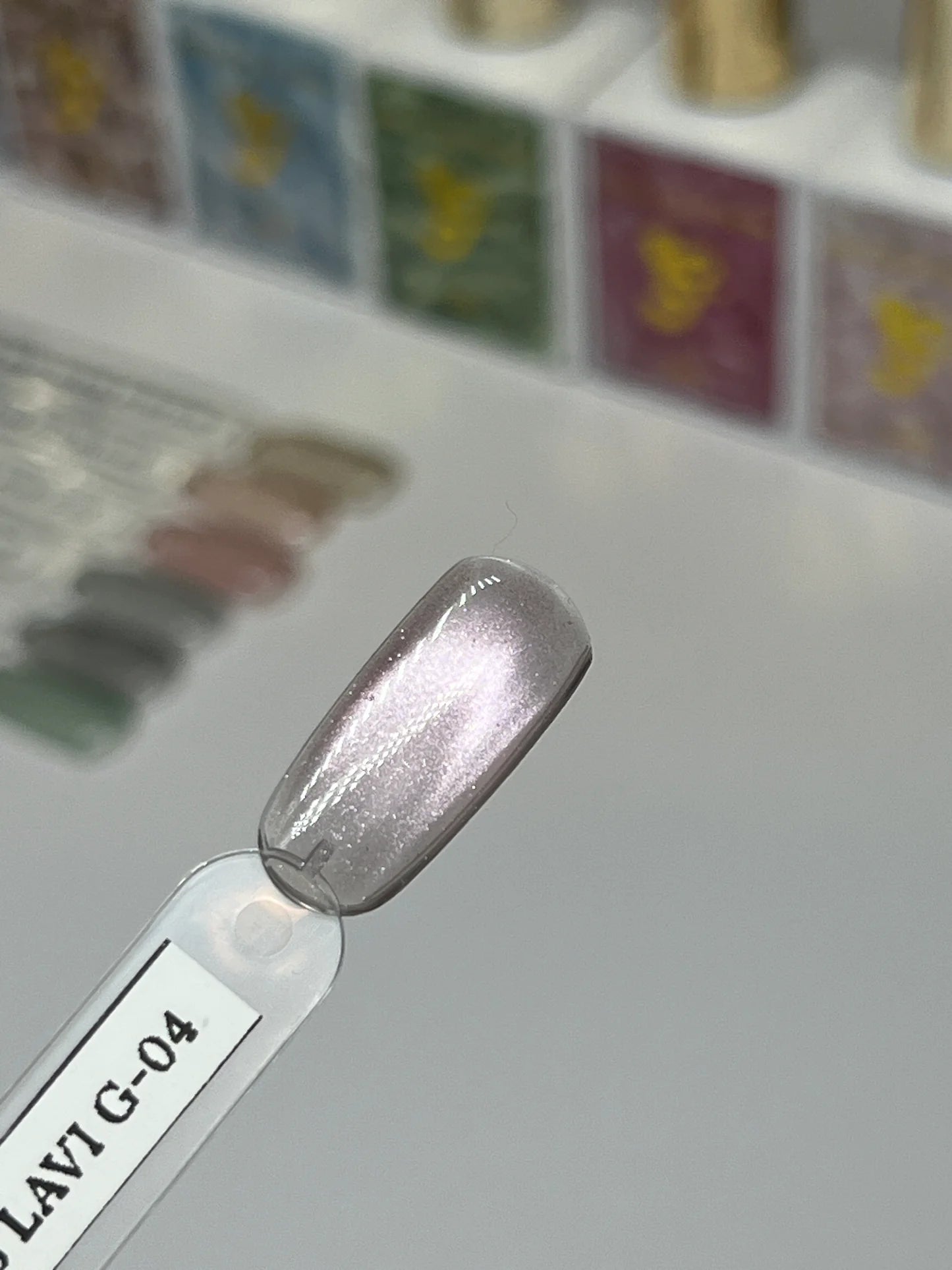 Sofi Art Gellicure Pro Cat Eye Gel in Lavi G-04, a vibrant gel polish with glass bead effect for elegant cat eye nails.