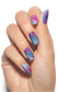 Harmony Gelish Blooming Gel nail polish in a pastel pink shade, displayed on a nail swatch with a glossy finish.
