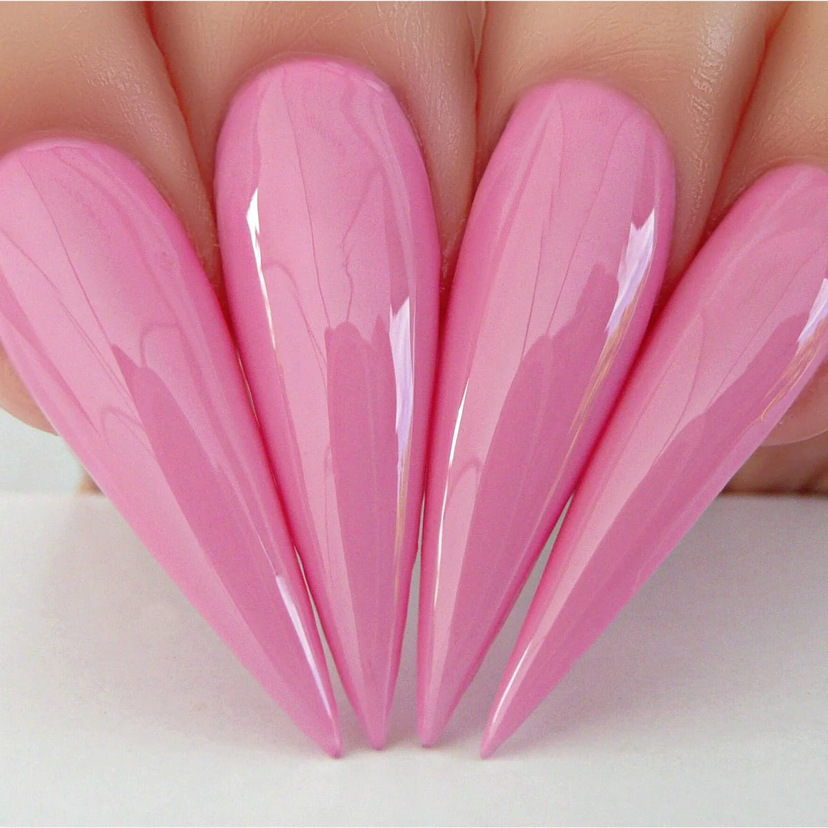 Kiara Sky Dip Powder Pink Tutu #D582 gel nail polish in a soft pink shade, displayed in a clear container with a white background.