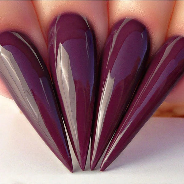 Kiara Sky gel nail polish in Posh Escape #504 with matching lacquer, clear gel bottle with black cap, on a white background.