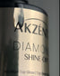 Luxio Diamond Shine-On Gel Polish top coat with tack-free, TPO-free finish, featuring a glossy, smooth surface in the image.