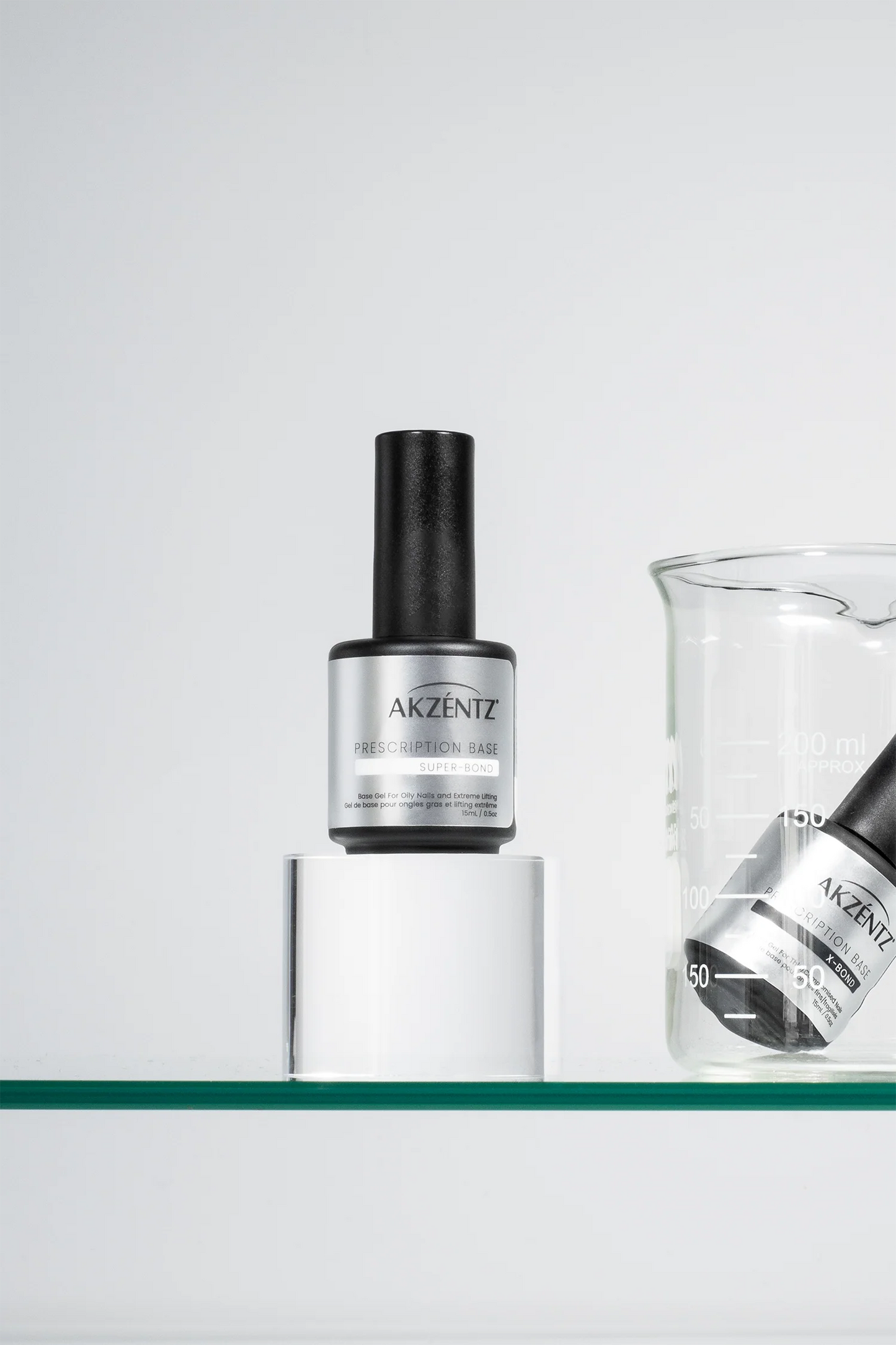 Luxio Luxio Gel Polish Prescription Soak Off Base™ Super-Bond applied on nails for strong adhesion and durability.