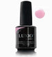 Luxio soak-off gel polish in a 15ml bouquet bottle, showcasing vibrant color and smooth, glossy finish on a nail.