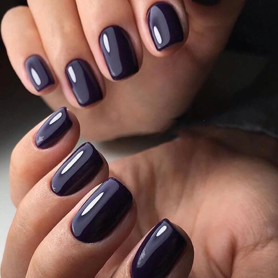 Luxio Soak-Off Gel Polish Abyss 15ml bottle with black cap and label, shown in a close-up shot.
