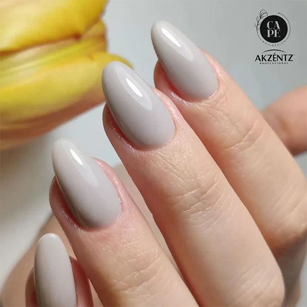 Luxio Aloof 15ml gel polish bottle featuring a sleek black cap and clear label, designed for professional nail application.