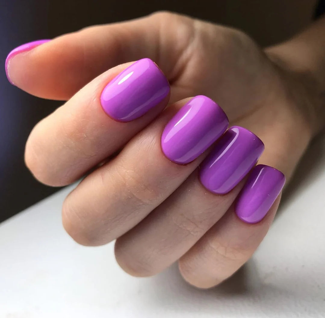 Luxio Soak-Off Gel Polish Attraction Bright 15ml bottle with vibrant pink color and sleek packaging.