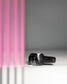 Luxio Gel Polish Blossom tint in 15ml bottle, showcasing the soft pink soak-off gel polish with floral-inspired color on the bottle