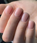Luxio Soak-Off Gel Polish in Sheer Blush, 15ml, showing the pastel pink gel bottle with a clear cap and elegant branding.