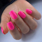 Luxio Soak-Off Gel Polish in Bombshell Bright 15ml bottle, showcasing vibrant coral color and glossy finish.