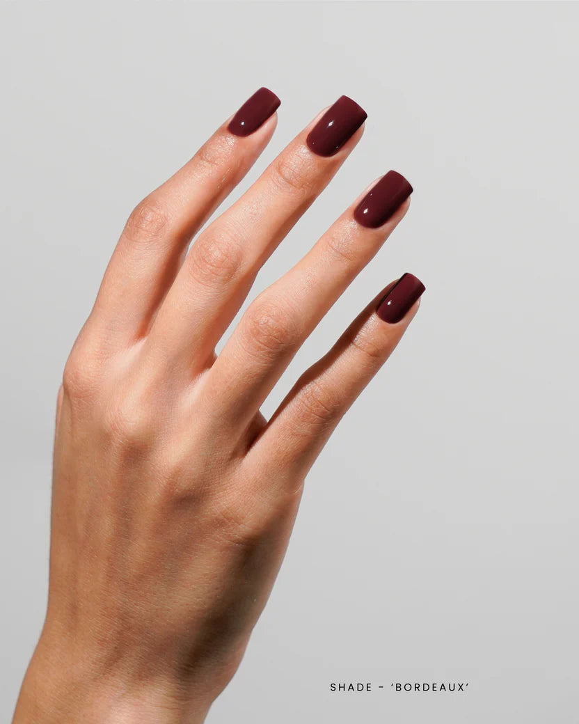 Luxio Soak-Off Gel Polish Bordeaux in 15ml bottle, TPO-free, showcasing a deep, rich burgundy nail polish color.