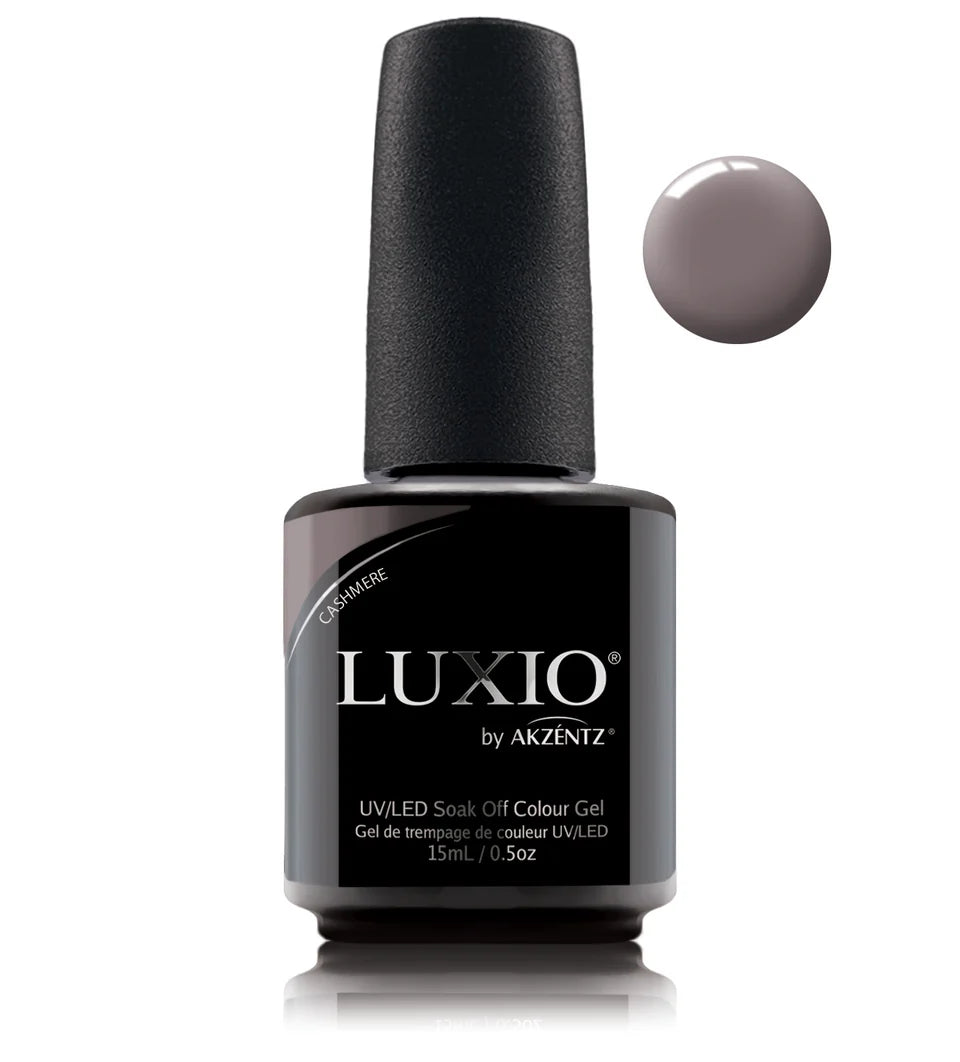 Luxio Soak-Off Gel Polish in Cashmere, 15ml, with smooth, creamy beige color and glossy finish on a nail art display