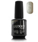 Luxio Soak-Off Gel Polish in Champagne Sparkle, 15ml bottle, showing the shimmering gel with a smooth, glossy finish.