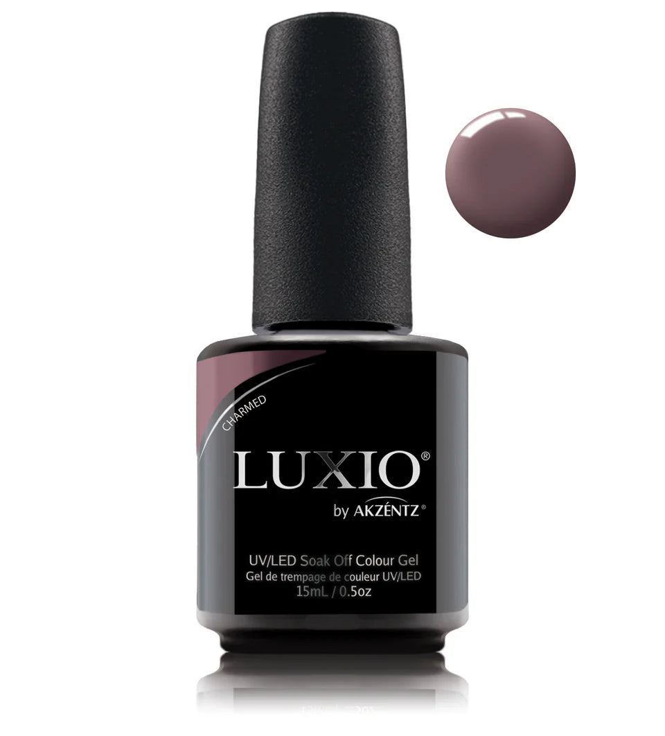 Luxio Charmed soak-off gel polish in 15ml jar, featuring a vibrant, glossy finish for professional nail art and manicures.
