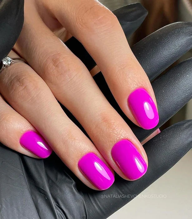 Luxio Chi-Chi soak-off gel polish in 15ml bottle, vibrant pink shade, featuring smooth, glossy finish on a neutral background.