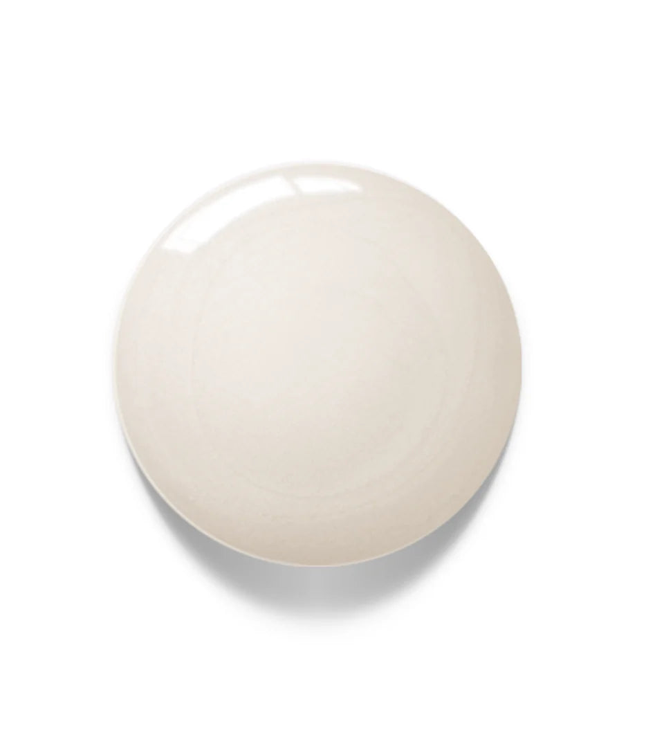 Luxio Soak-Off Gel Polish in Cloud, 15ml, showcasing the light, pastel nail polish color in a clear bottle with a white cap.