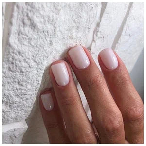 Luxio soak-off gel polish in Coy shade, 15ml bottle, featuring a glossy finish and smooth application on nails.