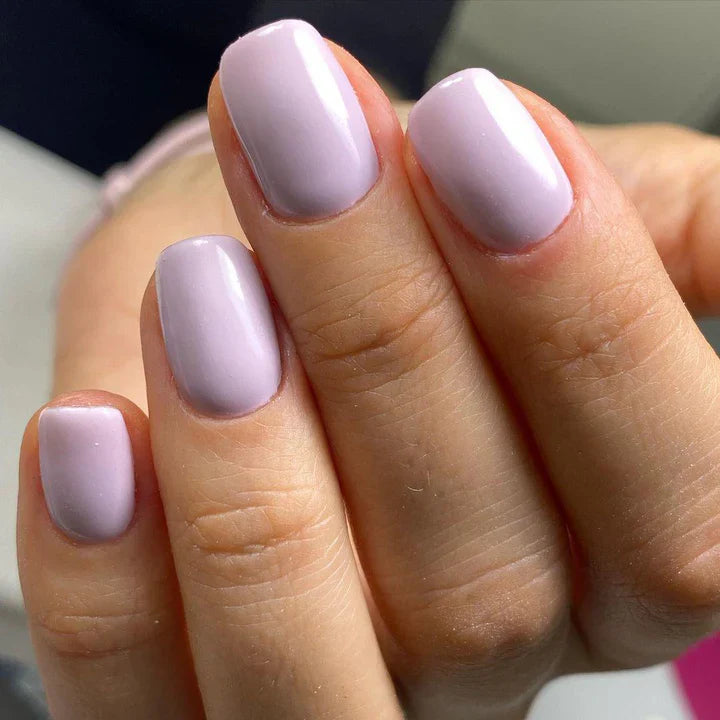 Luxio Luxio Soak-Off Gel Polish Crave 15ml bottle with vibrant pink-colored gel for nails, shown in a close-up image.
