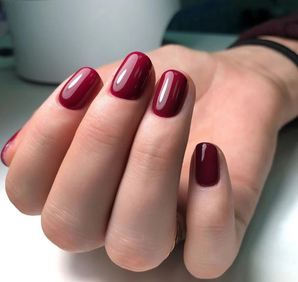 Luxio soak-off gel polish in 15ml bottle, featuring a sleek black cap and clear label, perfect for professional gel manicures.