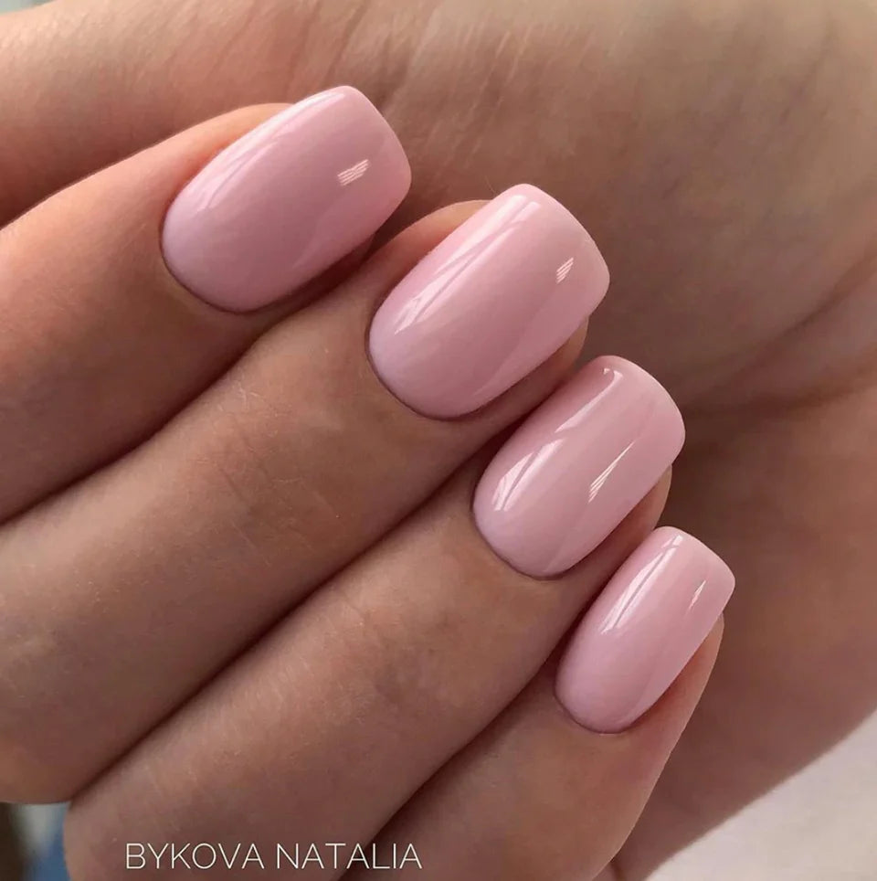 Luxio Soak-Off Gel Polish in Daintiest 15ml bottle, showing the elegant packaging and vibrant pink color.
