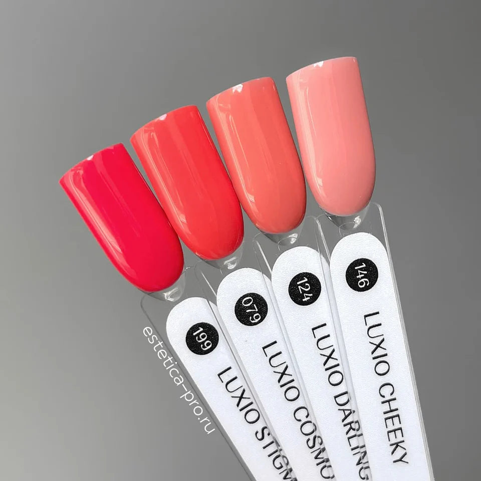 Luxio Luxio Soak-Off Gel Polish Darling 15ml bottle with vibrant pink nail polish and clear branding, close-up view