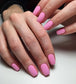Luxio Soak-Off Gel Polish in Delightful 15ml bottle with colorful nail art on well-manicured nails