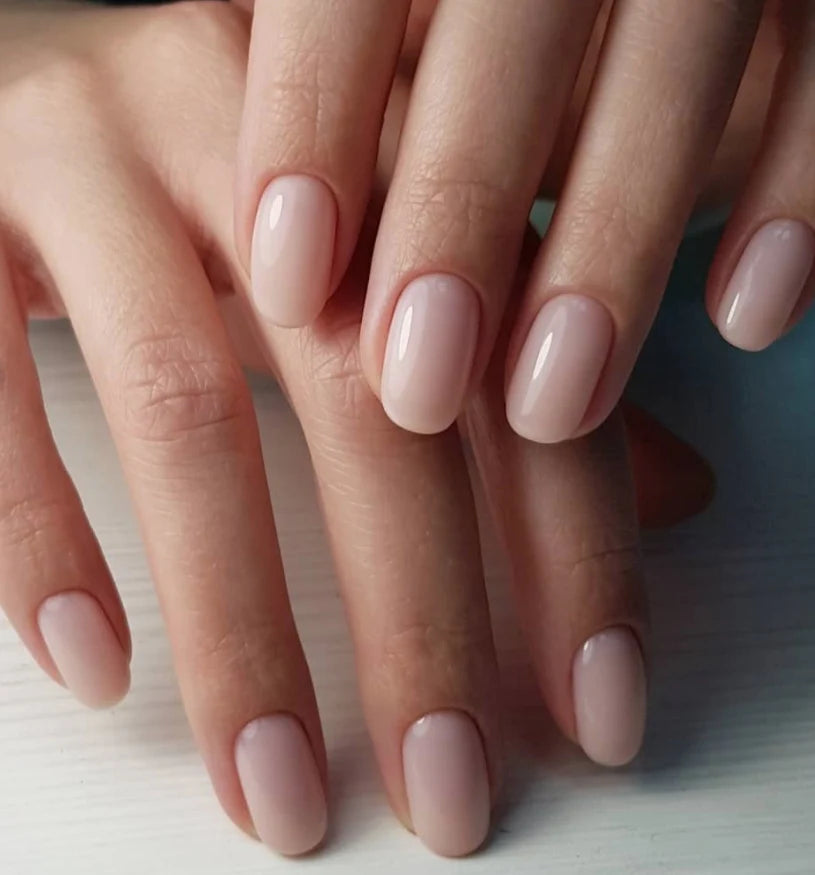 Luxio Soak-Off Gel Polish Demure sheer 15ml bottle with pink cap and label, showcasing Luxio brand gel polish product.
