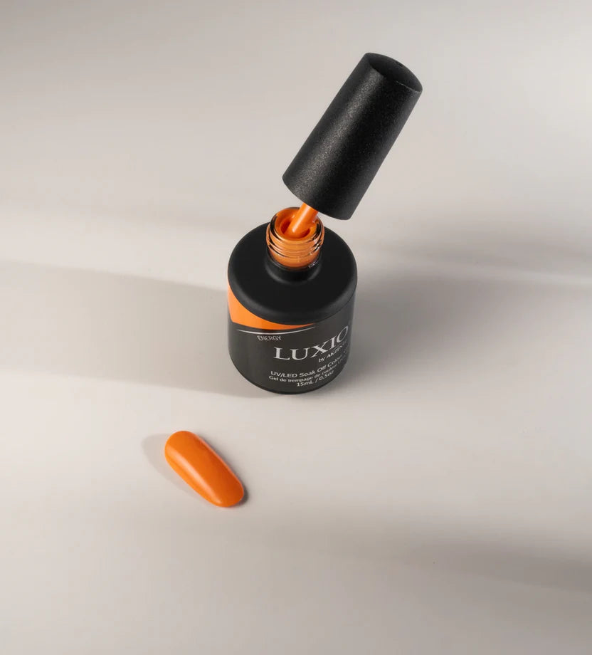 Open Luxio Soak-Off Gel Polish in Energy 15ml bottle showing vibrant gel inside, perfect for durable, salon-quality manicures.
