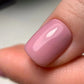 Luxio soak-off gel polish bottle labeled Eternity, 15ml, with a sleek black and gold design, placed on a white surface.