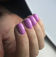 Luxio Soak-Off Gel Polish in Exposed 15ml bottle, showcasing a smooth, glossy pink nail color with a clear cap.