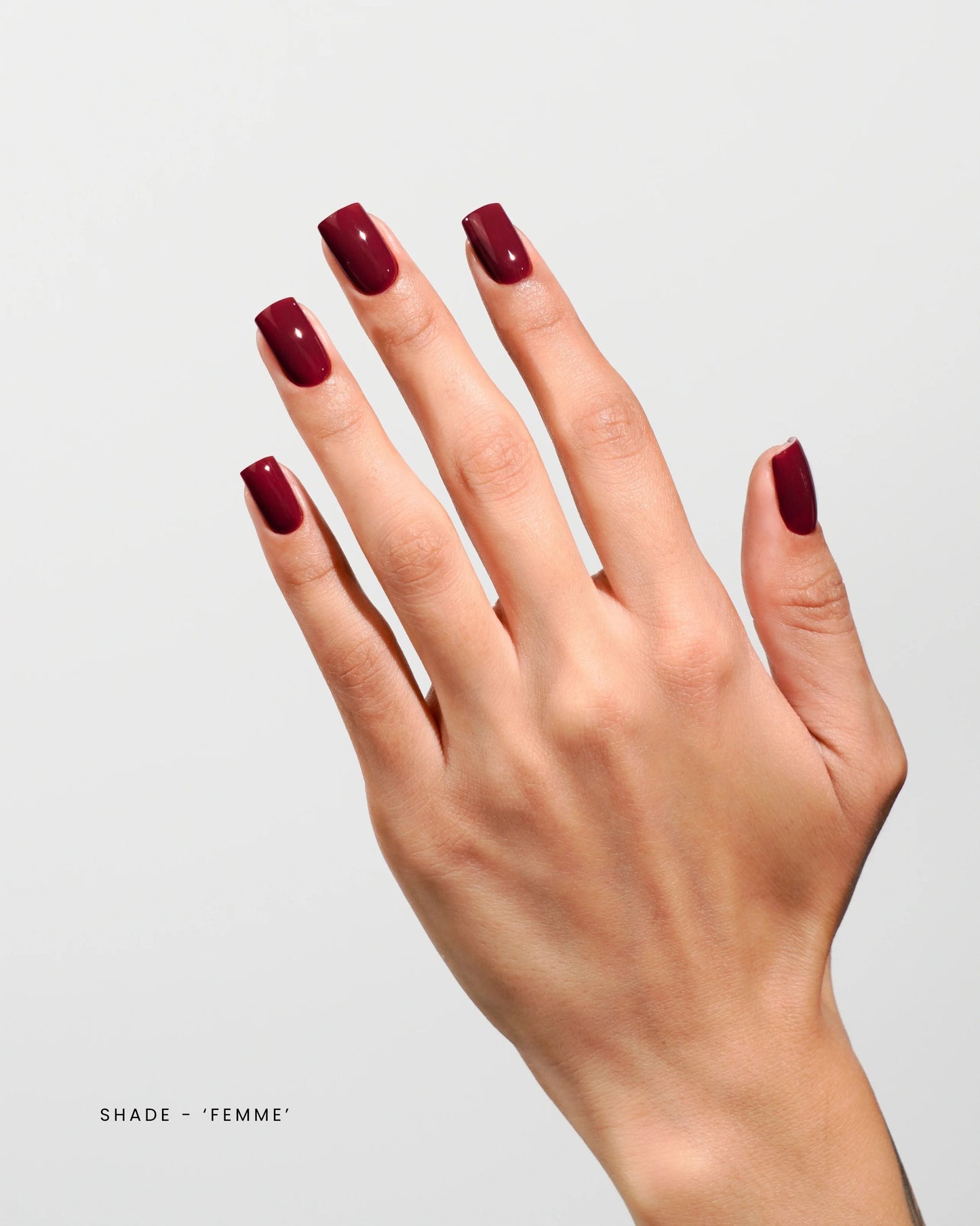 Luxio gel polish bottle labeled Luxio Soak-Off Gel Polish Femme, 15ml, TPO-Free, with a clear cap and colorful label.