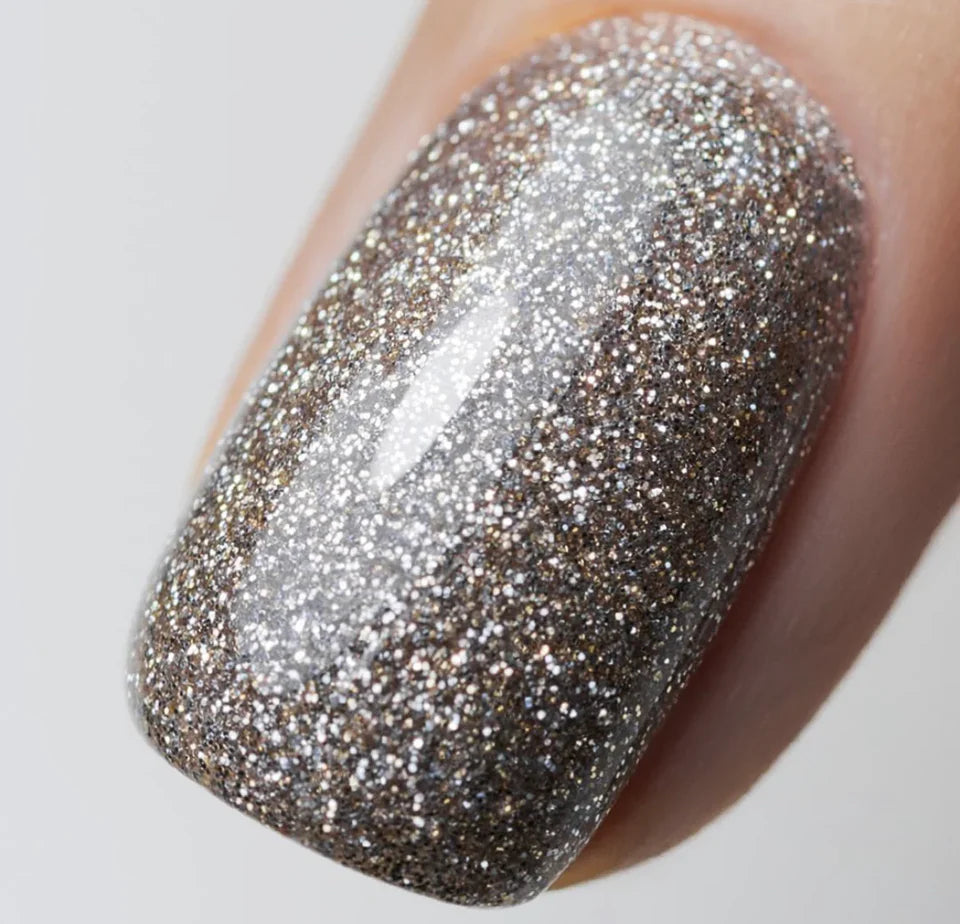 Luxio Luxio Soak-Off Gel Polish Figment with glitter, 15ml bottle, showcasing vibrant glittery nail polish in a clear container