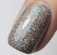 Luxio Luxio Soak-Off Gel Polish Figment with glitter, 15ml bottle, showcasing vibrant glittery nail polish in a clear container