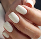 Luxio Soak-Off Gel Polish Finesse 15ml bottle with black cap and clear label, displayed on a white surface.