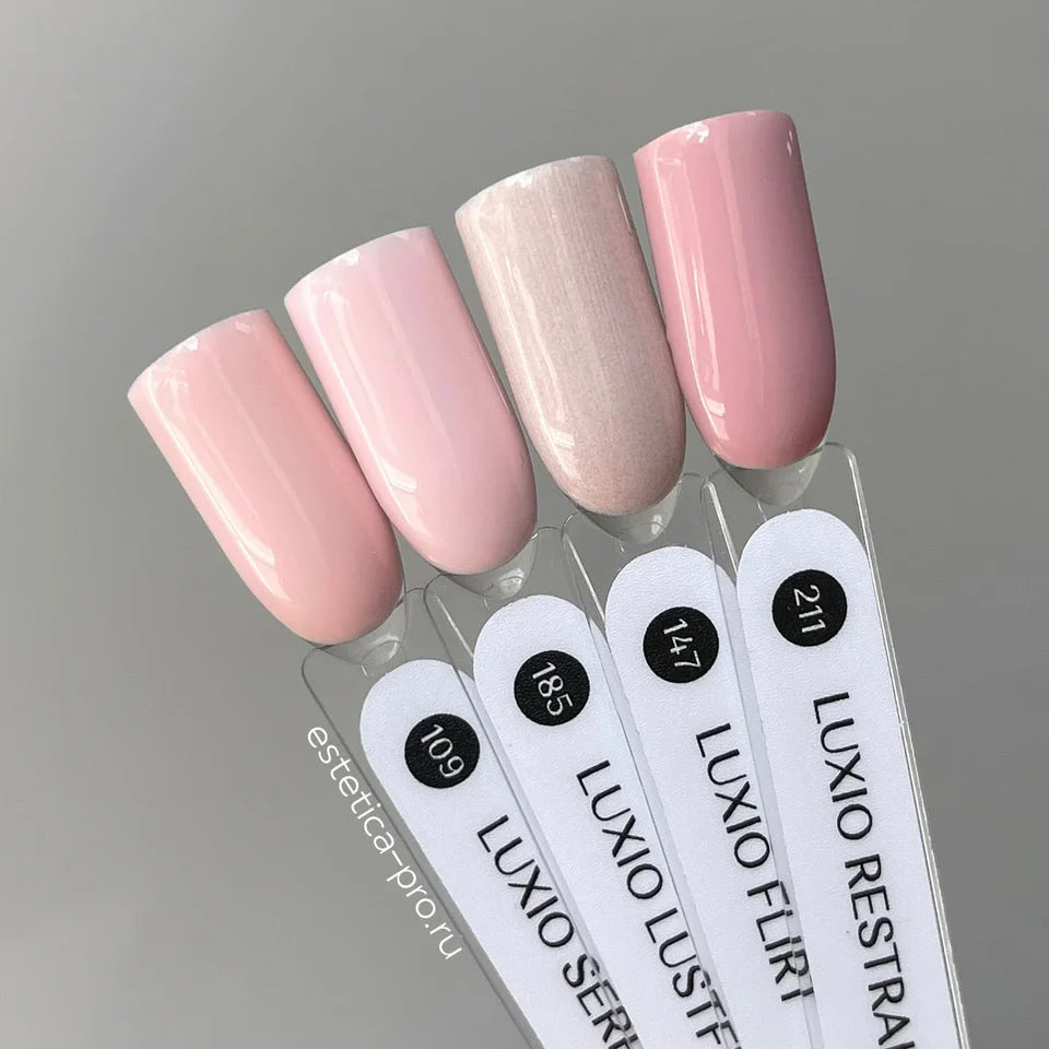 Luxio Soak-Off Gel Polish Flirt with shimmer, 15ml, showing the sparkling gel polish in a clear bottle with a black cap.