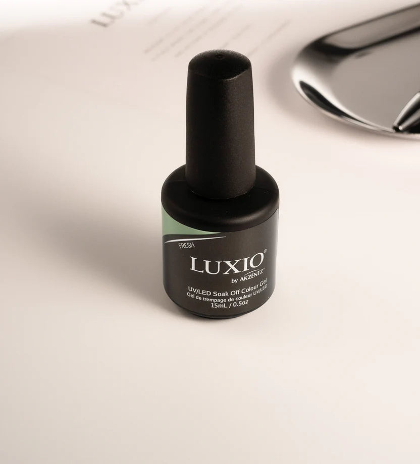 Luxio Fresh soak-off gel polish bottle, 15ml, with a clear label, showcasing the Luxio brand and vibrant packaging design.